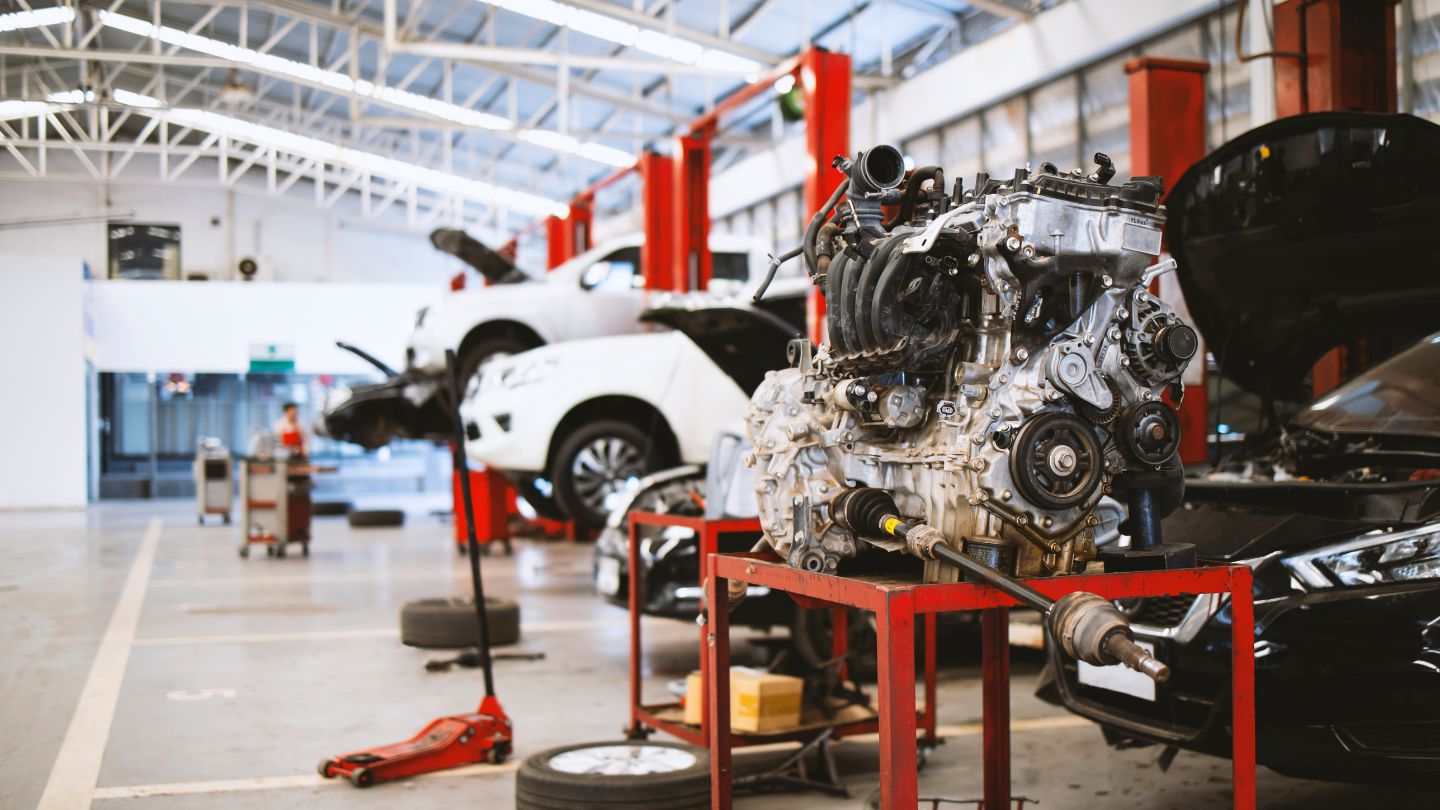 Car Engine Being Repaired in Garage