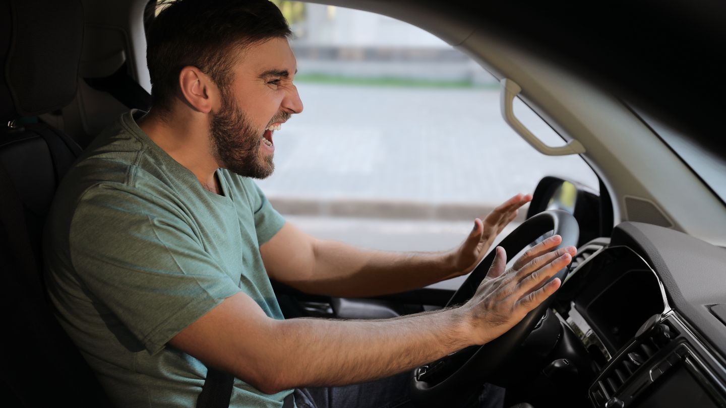 Man Being Aggressive While Driving